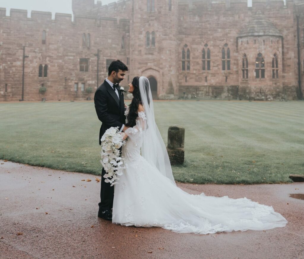 Bride & Groom outside castle grounds on their wedding day