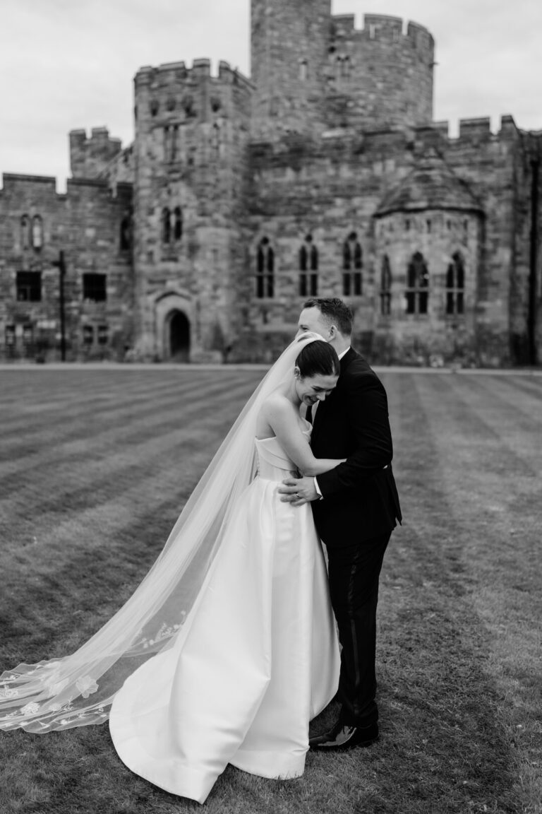 Mr & Mrs Cable at Peckforton Castle grounds on their wedding day