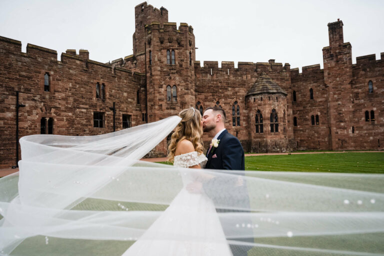 Mr & Mrs Windle at Peckforton Castle Grounds on their wedding day