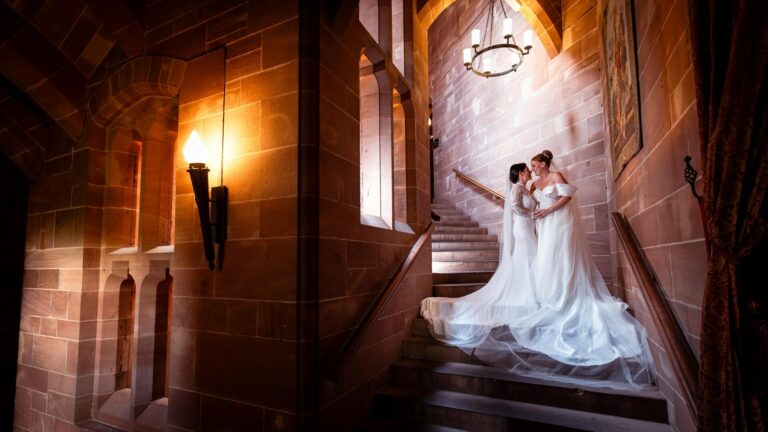 Same sex couple wedding at Peckforton Castle Stairs