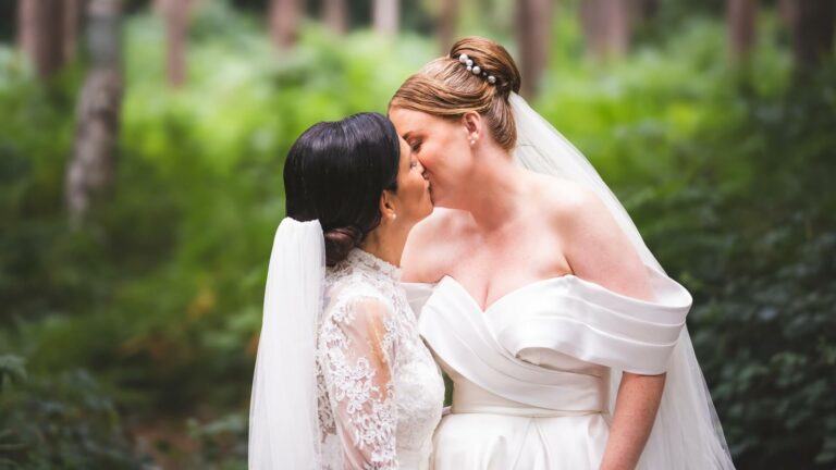 Same sex couple wedding at Peckforton Castle Forest